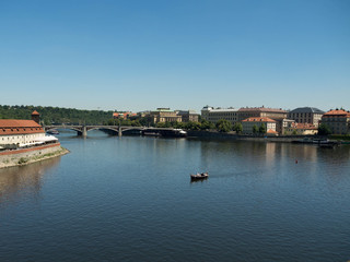 Fototapeta na wymiar Prague, Chezh republic, 2017. The Vltava River flows through the centre of Prague, and is the waterway around which the city has developed over the past 1000 years.