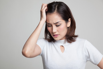 Young Asian woman got sick and  headache.