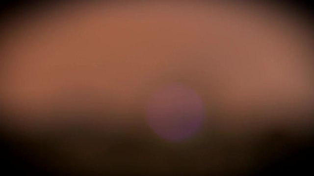 Night Shimmering Lights on a Brown Background
