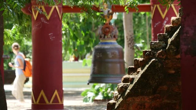 Bell behind the Alo-daw Pyi temple in Bagan, Myanmar, Burma