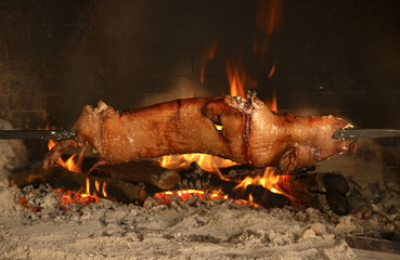 Roast pig on skewer. Serdiana. Sardinia island. Italy