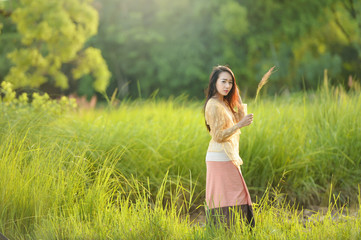 Fototapeta na wymiar Asian woman wearing traditional thai culture lanna style,vintage style,chaingmai Thailand