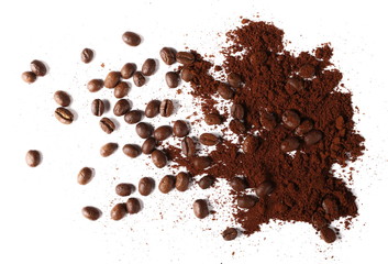 Pile of powdered, instant coffee and beans isolated on white background, top view