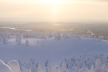 Beautiful cold mountain view of ski resort, sunny winter day with slope, piste and ski lift
