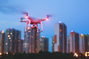 A process of launching the quadcopter drone with camera, operator launches quadcopter uav, unmanned aerial vehicle flying
