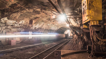 Underground mine crosscut vehicle manipulation