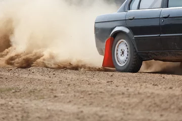 Cercles muraux Sport automobile Rally Car turning in dirt track (rear wheel drive)