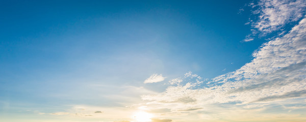Beautiful blue sky and fluffy clouds panorama with sunlight