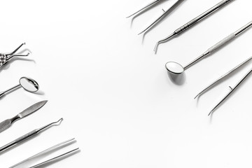 dentist office with tools for teeth care on white background top view mock up