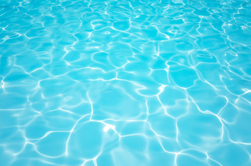 Naklejka na ściany i meble Blue and bright ripple water and surface in swimming pool , Beautiful motion gentle wave in pool