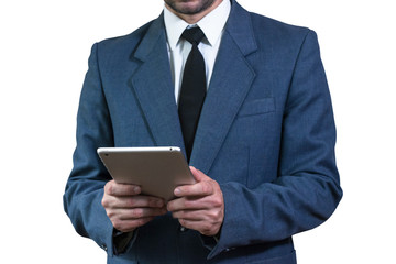 Young businessman in a jacket and white shirt, holding a tablet