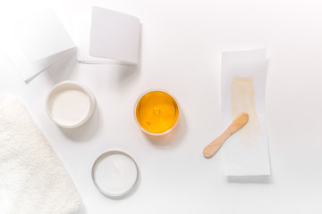 Set for depilation with wax on white background top view