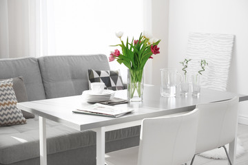 Modern living room with table and chairs