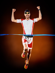 one caucasian  man runner running  triathlon ironman isolated