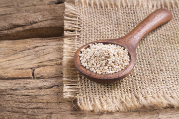 Grains of quinua on wood - Chenopodium quinoa