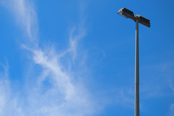 A lantern against the blue sky.