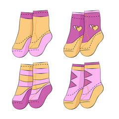 Four pairs of baby girl socks on white background