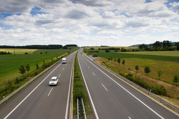 Highway transportation with cars and truck. View from above.