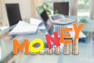 Money wording on coins stack, isolate on white background