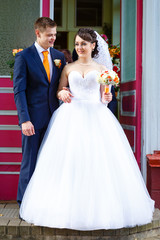 luxury romantic happy bride and groom celebrating marriage on the background of city