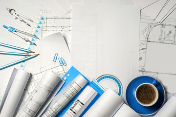 Workplace of architect - rolls and plans.
