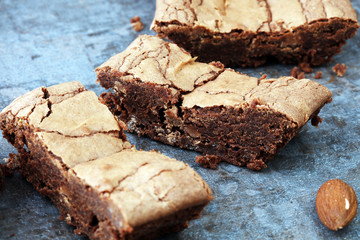 homemade chocolate brownies on grey background