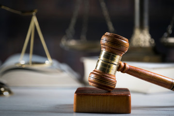 Symbol of law and justice. Concept law and justice. Scales of justice, gavel and book.