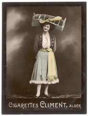 Girl in Aeroplane Hat. Date: circa 1909