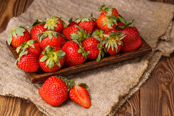 Strawberries on plate, linen fabric