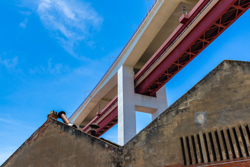 Fototapeta na wymiar Bottom view of the construction of the bridge on April 25th in Lisbon