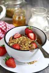 Granola with fresh strawberry - healthy breakfast.