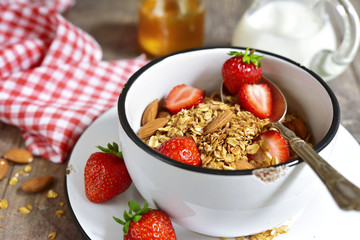 Granola with fresh strawberry - healthy breakfast.