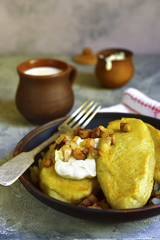 Fried zeppelin (cepelinai) - tradishional lithuanian potato patty stuffed with meat.