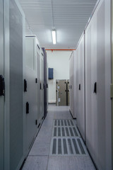 Switchgear room with cabinets with network hardware