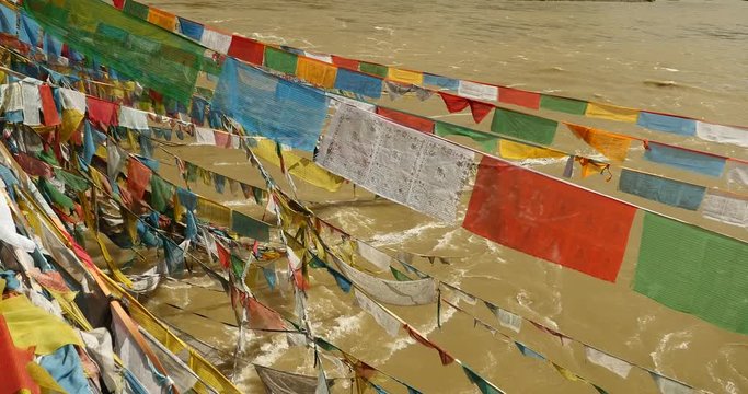 4k prayer flag on lhasa river,tibet.