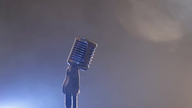 Microphone on stage with smoke