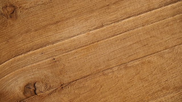 Wooden surface background. Old natural wood texture. Dolly sliding shot 4K ProRes HQ codec