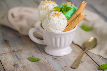 Vanilla and mint ice cream in cup