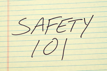 The words "Safety 101" on a yellow legal pad