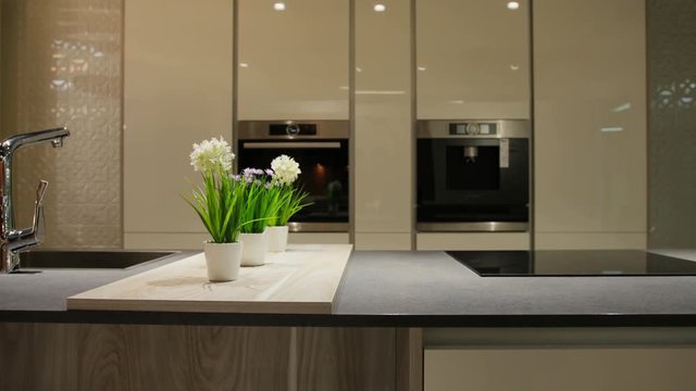 Close up view of white stylish plase for the cooking at the kitchen in the modern light style.