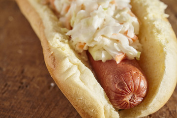 organic beef hot dogs in buns with cole slaw
