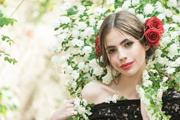 Fototapeta premium girl with fashionable spanish makeup, rose flower in hair
