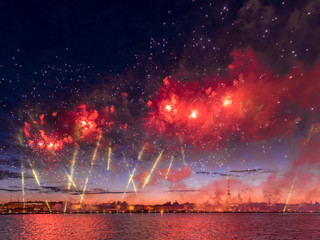 Fototapeta na wymiar Fireworks at Neva river during Scarlet Sails festival in Saint Petersburg, Russia