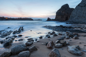 Fototapeta na wymiar Sunset in the Portio Beach. Liencres. Cantabria. Spain.