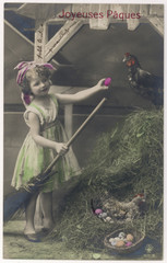 Little girl with coloured eggs in a poultry yard. Date: circa 1910