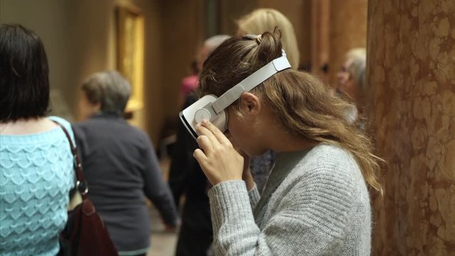 Woman Wearing VR Headset at museum
