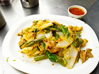 Suki without broths, stir fried mixed vegetable in sukiyaki sauce on plate.