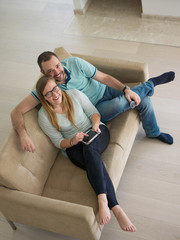 Fototapeta na wymiar couple relaxes in the living room