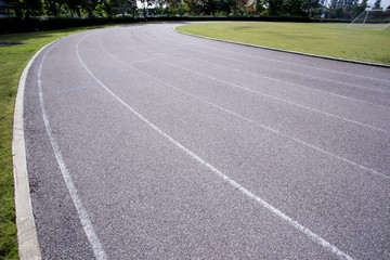 Gray treadmill at the stadium with the numbering from one to seven