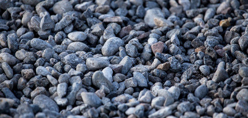 Crushed stone on the road as a background